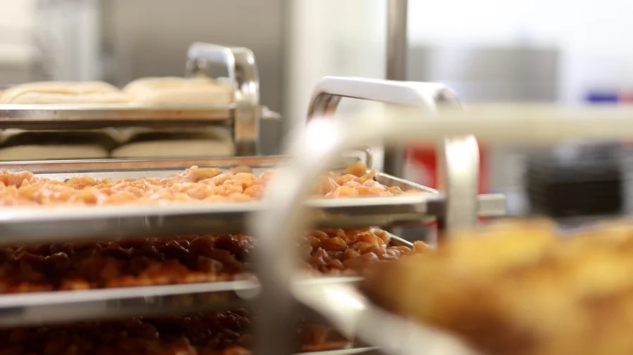 Food entrepreneurs collaborating in the Lake Aire Rentals commercial kitchen